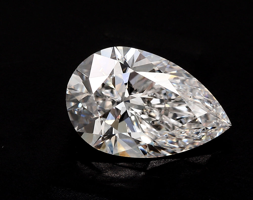 2.59 Carat Pear Lab Diamond with  Cut Diamond in 14KT  view 1
