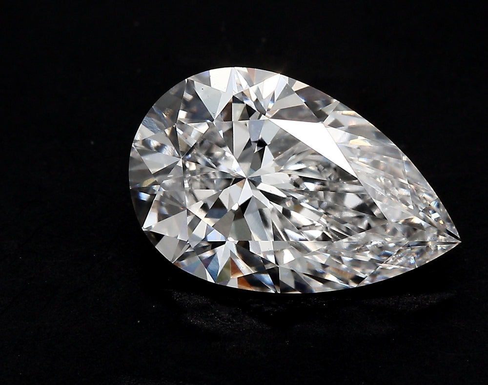 3.07 Carat Pear Lab Diamond with  Cut Diamond in 14KT  view 1
