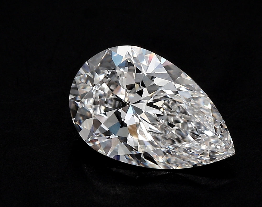 3.41 Carat Pear Lab Diamond with  Cut Diamond in 14KT  view 1
