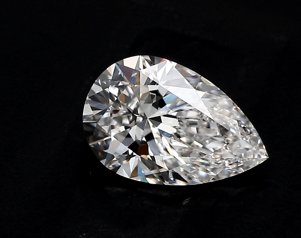 1.59 Carat Pear Lab Diamond with  Cut Diamond in 14KT  view 1
