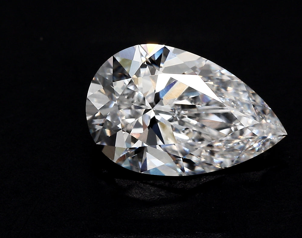 5.27 Carat Pear Lab Diamond with  Cut Diamond in 14KT  view 1
