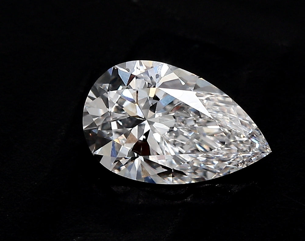 2.51 Carat Pear Lab Diamond with  Cut Diamond in 14KT  view 1
