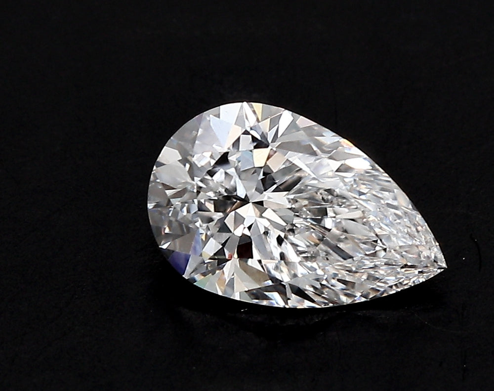 0.52 Carat Pear Lab Diamond with  Cut Diamond in 14KT  view 1
