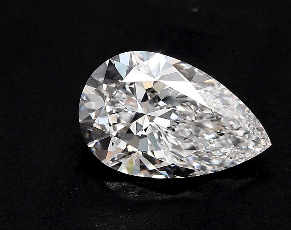 3.07 Carat Pear Lab Diamond with  Cut Diamond in 14KT  view 1
