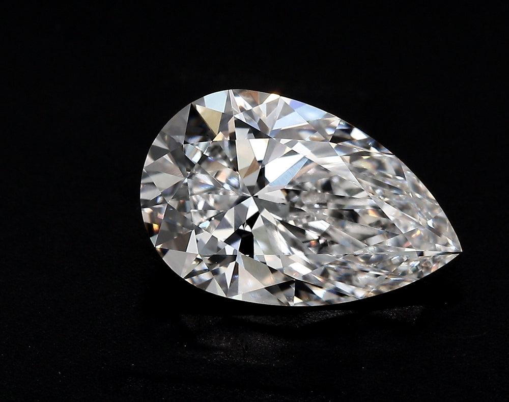1.63 Carat Pear Lab Diamond with  Cut Diamond in 14KT  view 1
