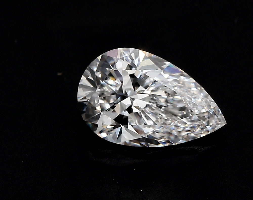 1.55 Carat Pear Lab Diamond with  Cut Diamond in 14KT  view 1
