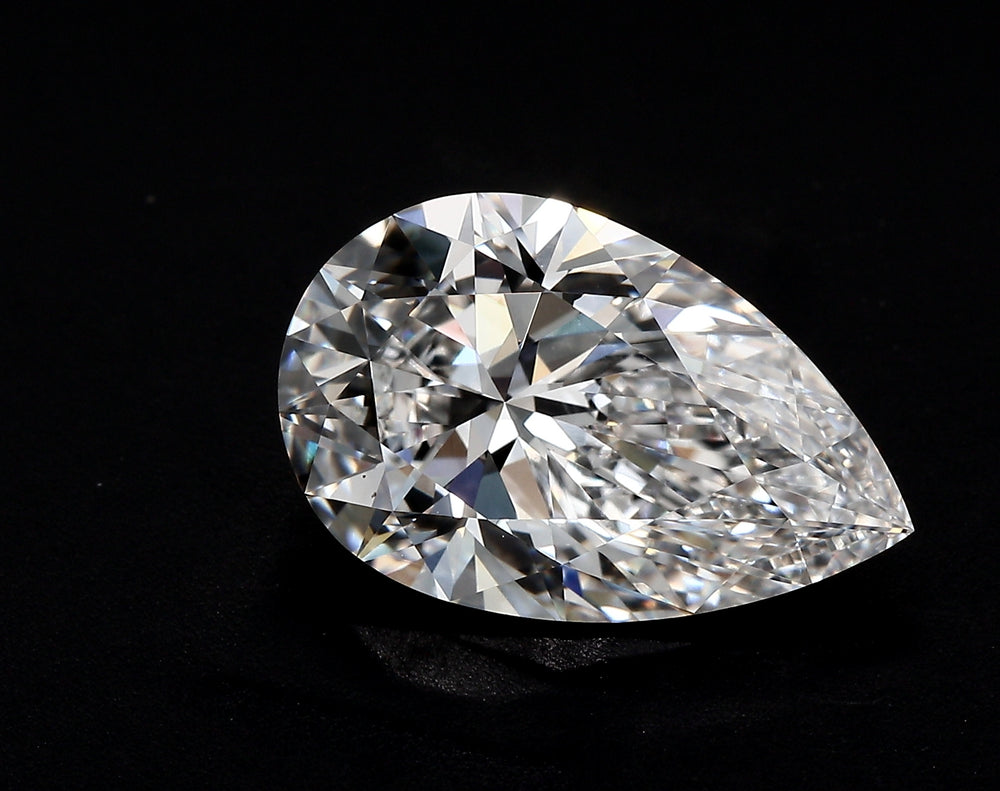 1.76 Carat Pear Lab Diamond with  Cut Diamond in 14KT  view 1
