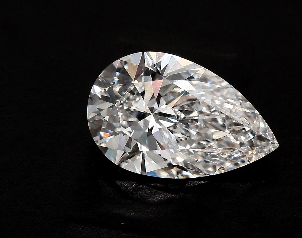 1.51 Carat Pear Lab Diamond with  Cut Diamond in 14KT  view 1
