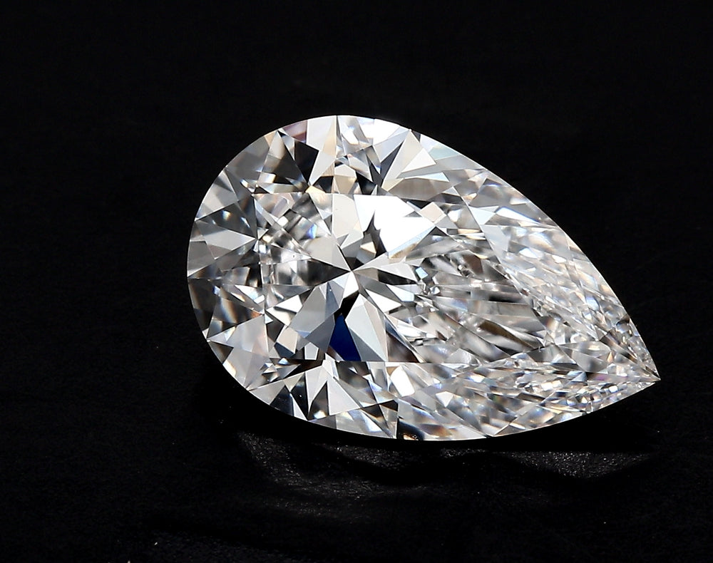 3.08 Carat Pear Lab Diamond with  Cut Diamond in 14KT  view 1
