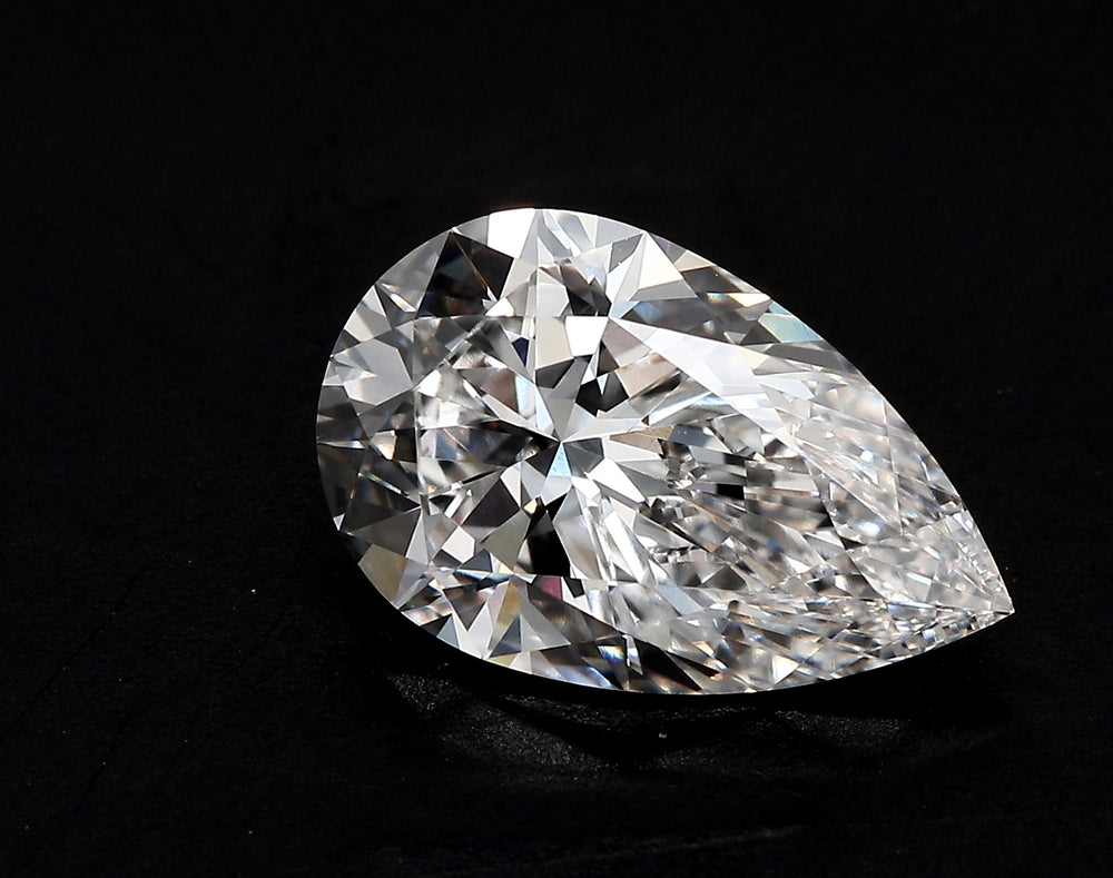 3.31 Carat Pear Lab Diamond with  Cut Diamond in 14KT  view 1
