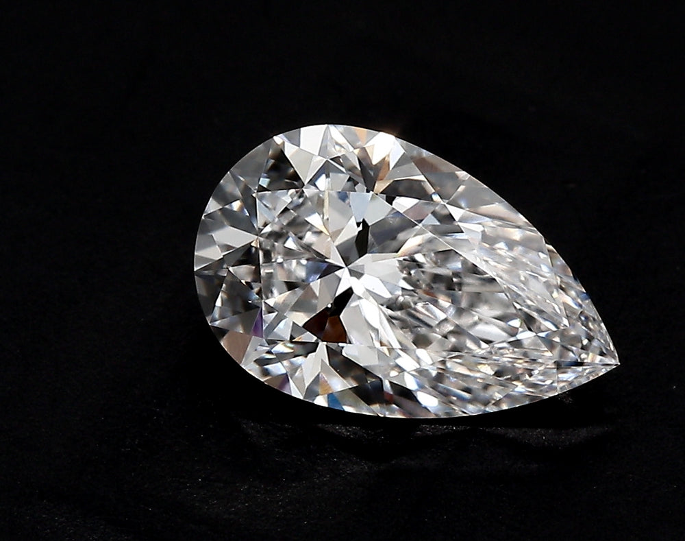3.9 Carat Pear Lab Diamond with  Cut Diamond in 14KT  view 1
