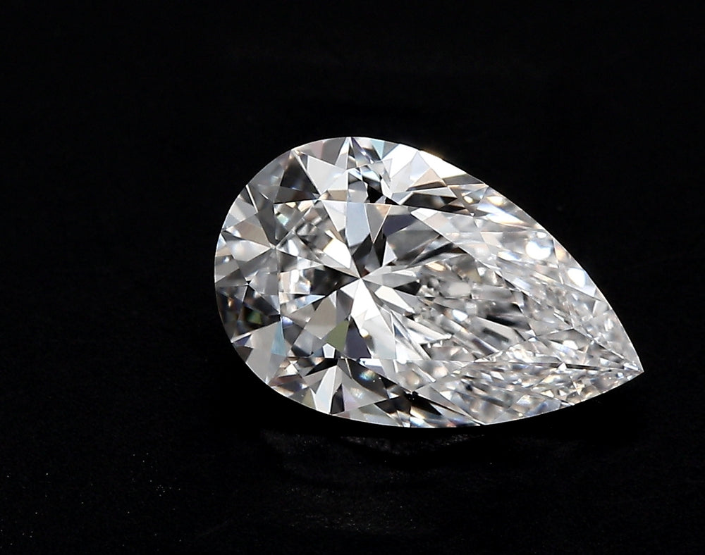 2.26 Carat Pear Lab Diamond with  Cut Diamond in 14KT  view 1
