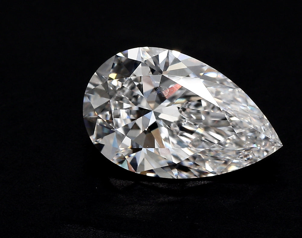 3.5 Carat Pear Lab Diamond with  Cut Diamond in 14KT  view 1
