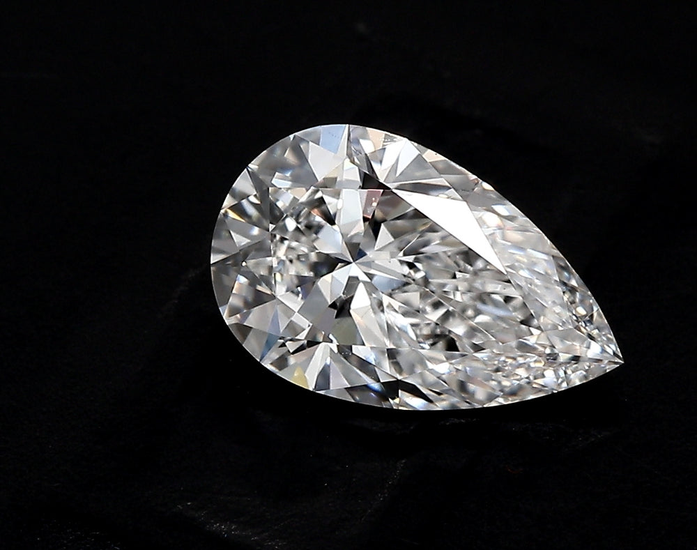 4.92 Carat Pear Lab Diamond with  Cut Diamond in 14KT  view 1
