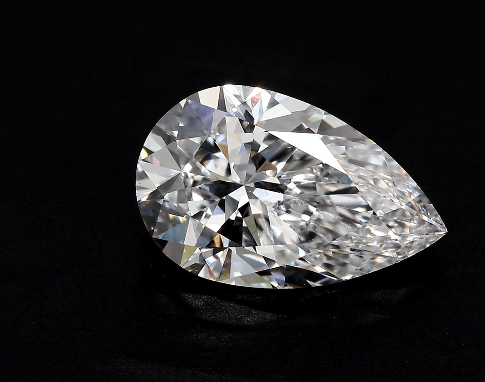 2.48 Carat Pear Lab Diamond with  Cut Diamond in 14KT  view 1
