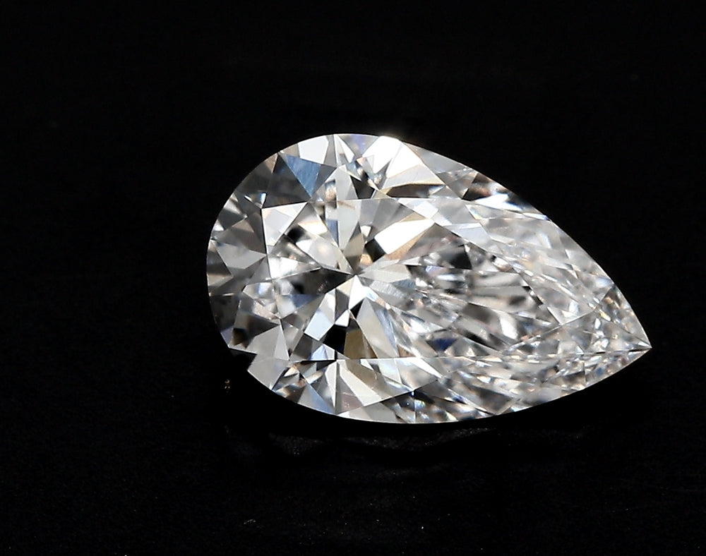 1.55 Carat Pear Lab Diamond with  Cut Diamond in 14KT  view 1
