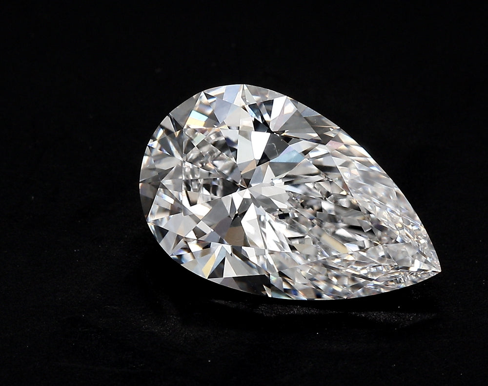 2.55 Carat Pear Lab Diamond with  Cut Diamond in 14KT  view 1
