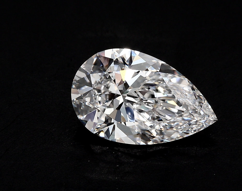 3.82 Carat Pear Lab Diamond with  Cut Diamond in 14KT  view 1
