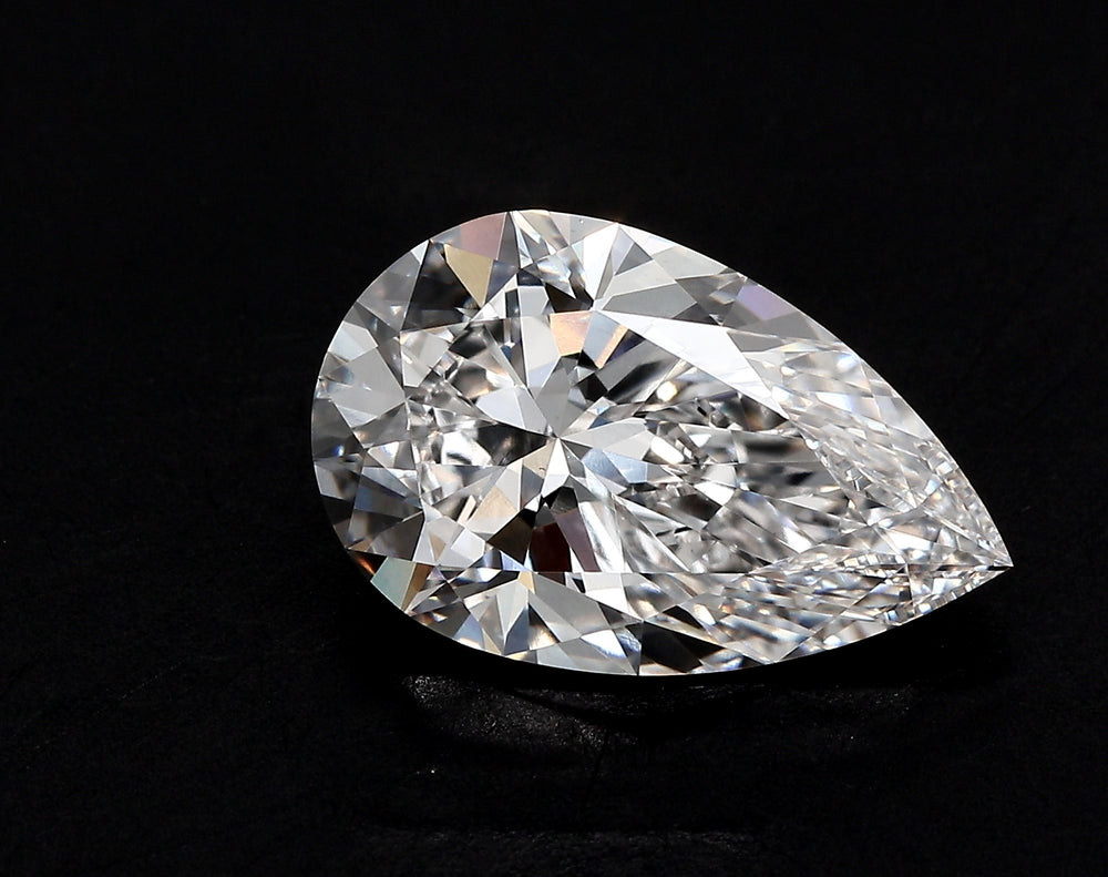 2.32 Carat Pear Lab Diamond with  Cut Diamond in 14KT  view 1
