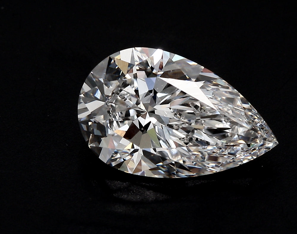 2.5 Carat Pear Lab Diamond with  Cut Diamond in 14KT  view 1
