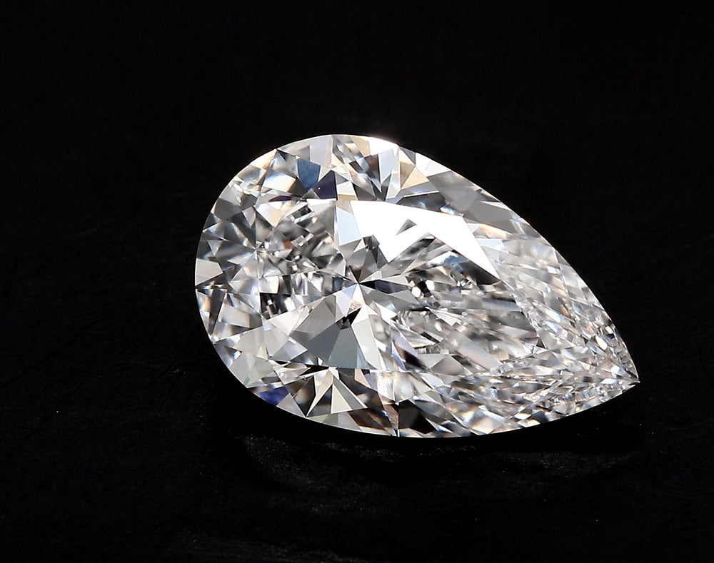 1.37 Carat Pear Lab Diamond with  Cut Diamond in 14KT  view 1
