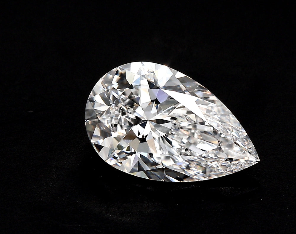 1.51 Carat Pear Lab Diamond with  Cut Diamond in 14KT  view 1
