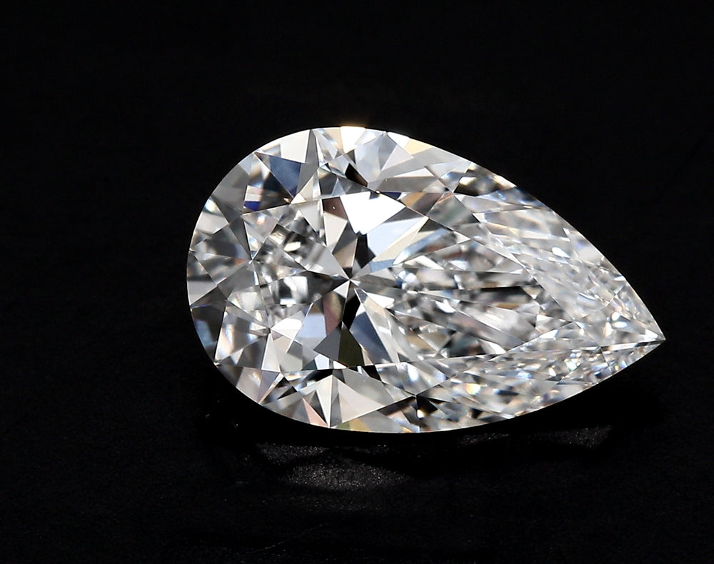 1.85 Carat Pear Lab Diamond with  Cut Diamond in 14KT  view 1
