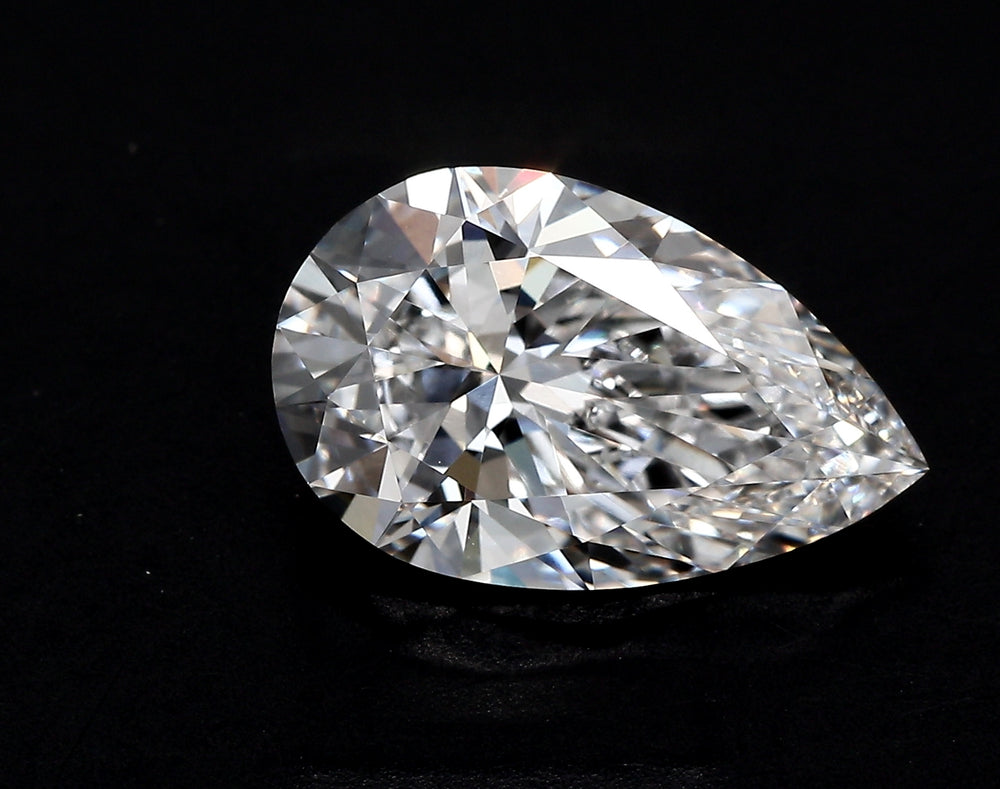 3.23 Carat Pear Lab Diamond with  Cut Diamond in 14KT  view 1
