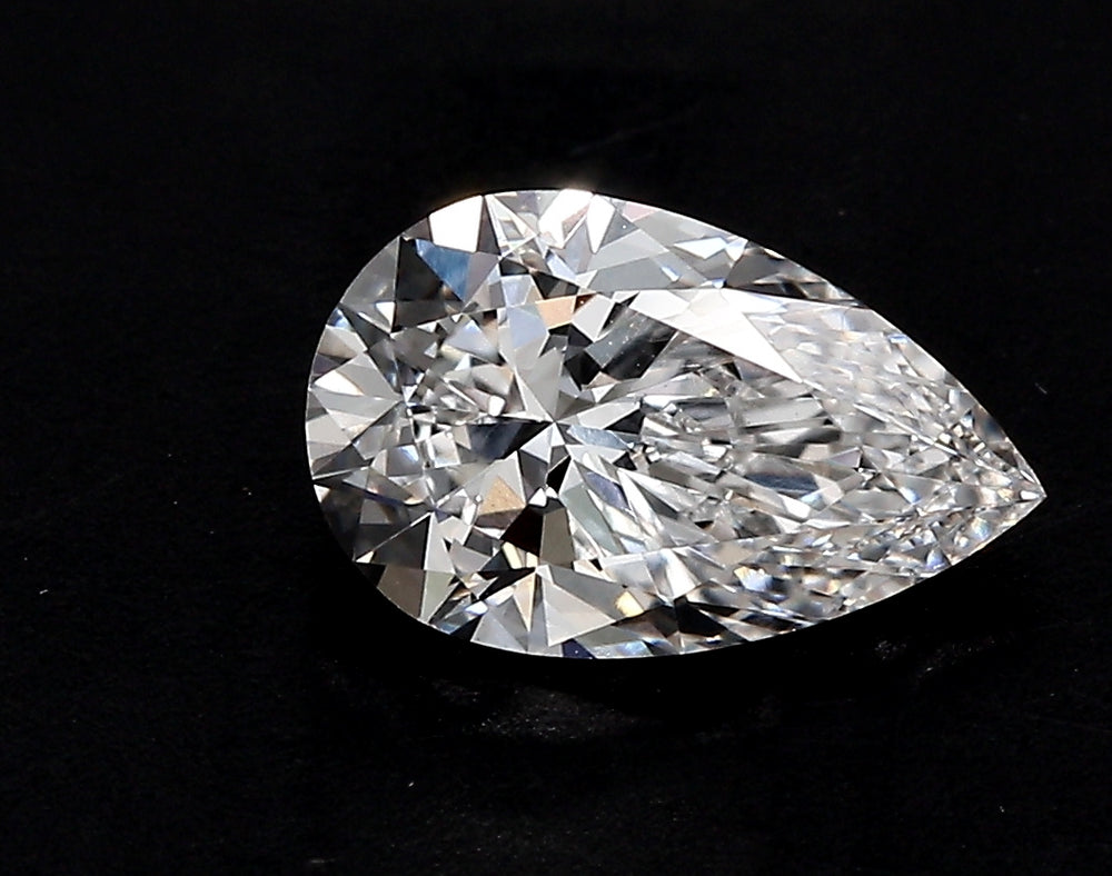 3.5 Carat Pear Lab Diamond with  Cut Diamond in 14KT  view 1
