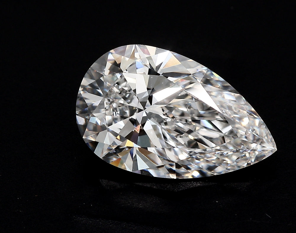 2.73 Carat Pear Lab Diamond with  Cut Diamond in 14KT  view 1

