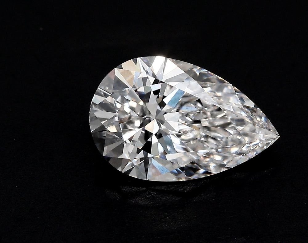 1.59 Carat Pear Lab Diamond with  Cut Diamond in 14KT  view 1
