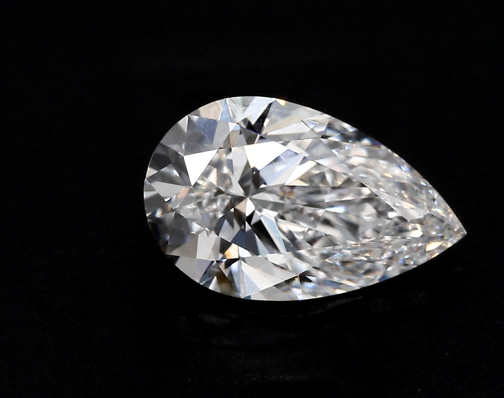 1.59 Carat Pear Lab Diamond with  Cut Diamond in 14KT  view 1
