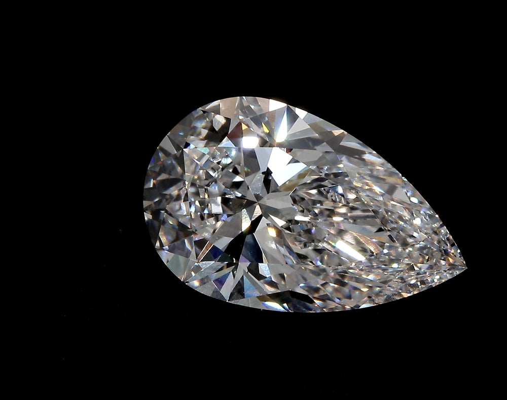 1.51 Carat Pear Lab Diamond with  Cut Diamond in 14KT  view 1

