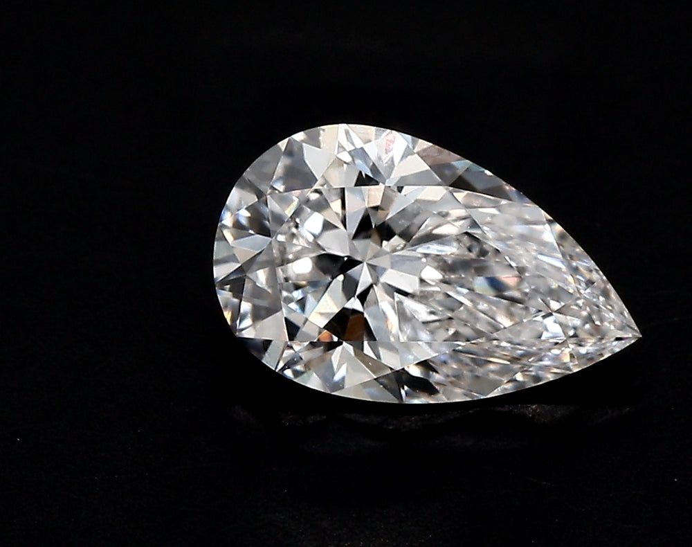 0.5 Carat Pear Lab Diamond with  Cut Diamond in 14KT  view 1
