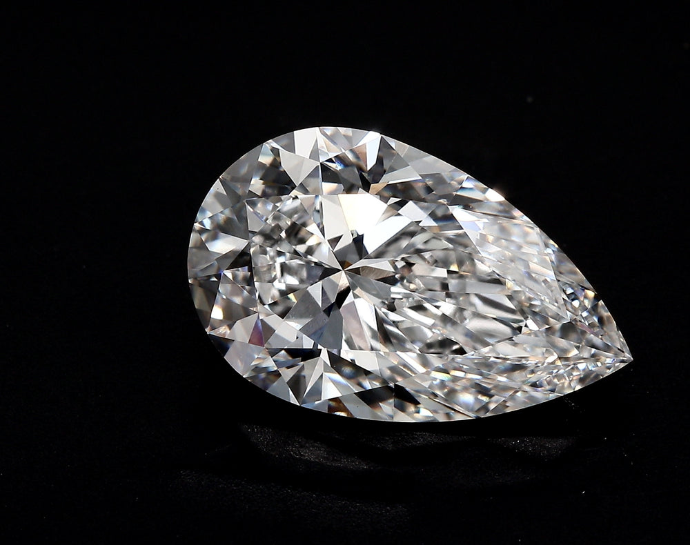 3.56 Carat Pear Lab Diamond with  Cut Diamond in 14KT  view 1

