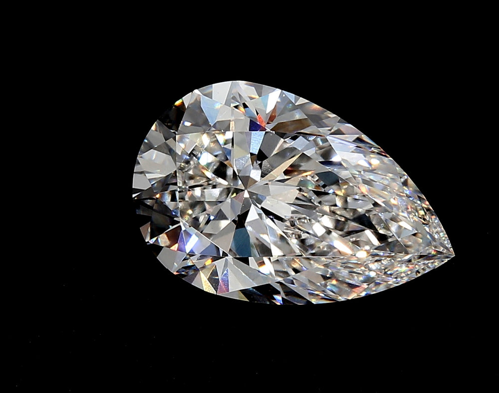 4.05 Carat Pear Lab Diamond with  Cut Diamond in 14KT  view 1
