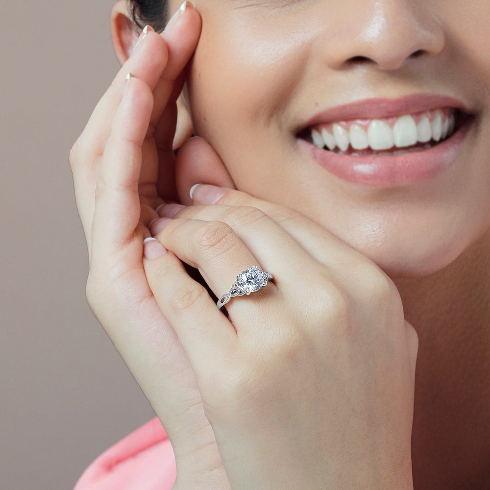 Model Wearing Fine Vintage Celtic Entwined Trinity Knot Engagement Ring view