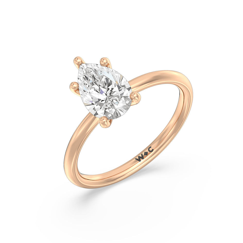 Classic Four Prong Solitaire Diamond Engagement Ring with Pear Cut Diamond in 14KT Rose Gold view 4
