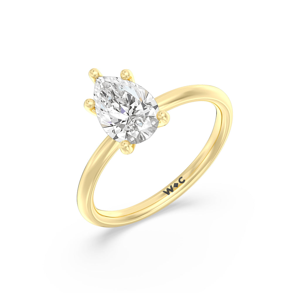 Classic Four Prong Solitaire Diamond Engagement Ring with Pear Cut Diamond in 14KT Yellow Gold view 4

