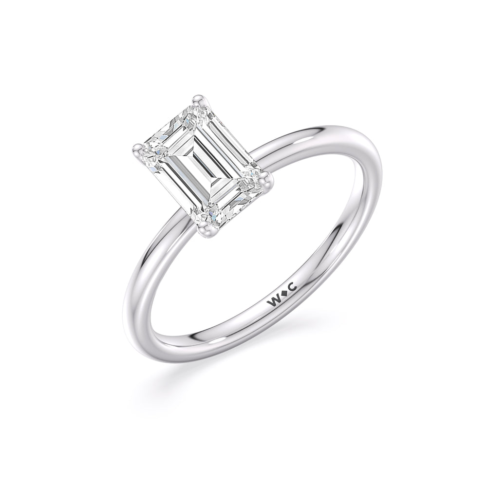 Classic Four Prong Petite Comfort Fit Solitaire Engagement Ring with Emerald Cut Diamond in 14KT Platinum view 4
