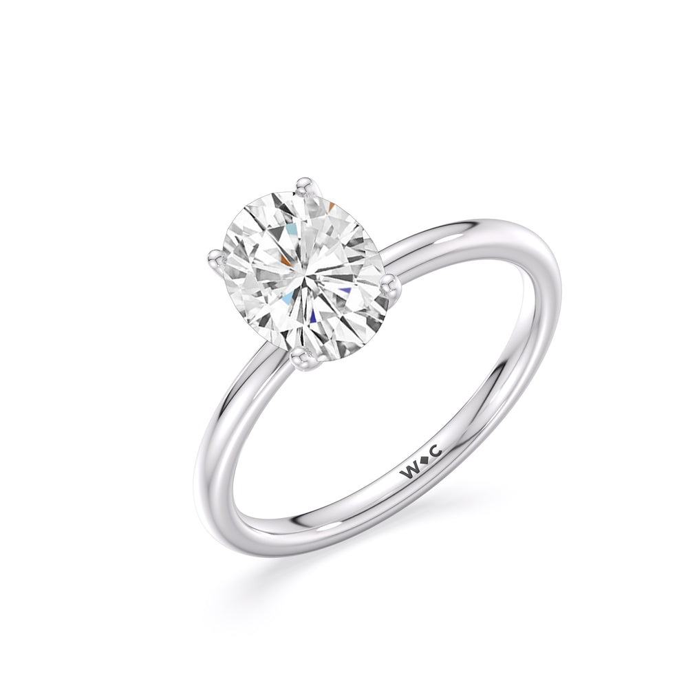 Classic Four Prong Petite Comfort Fit Solitaire Engagement Ring with Oval Cut Diamond in 14KT Platinum view 4
