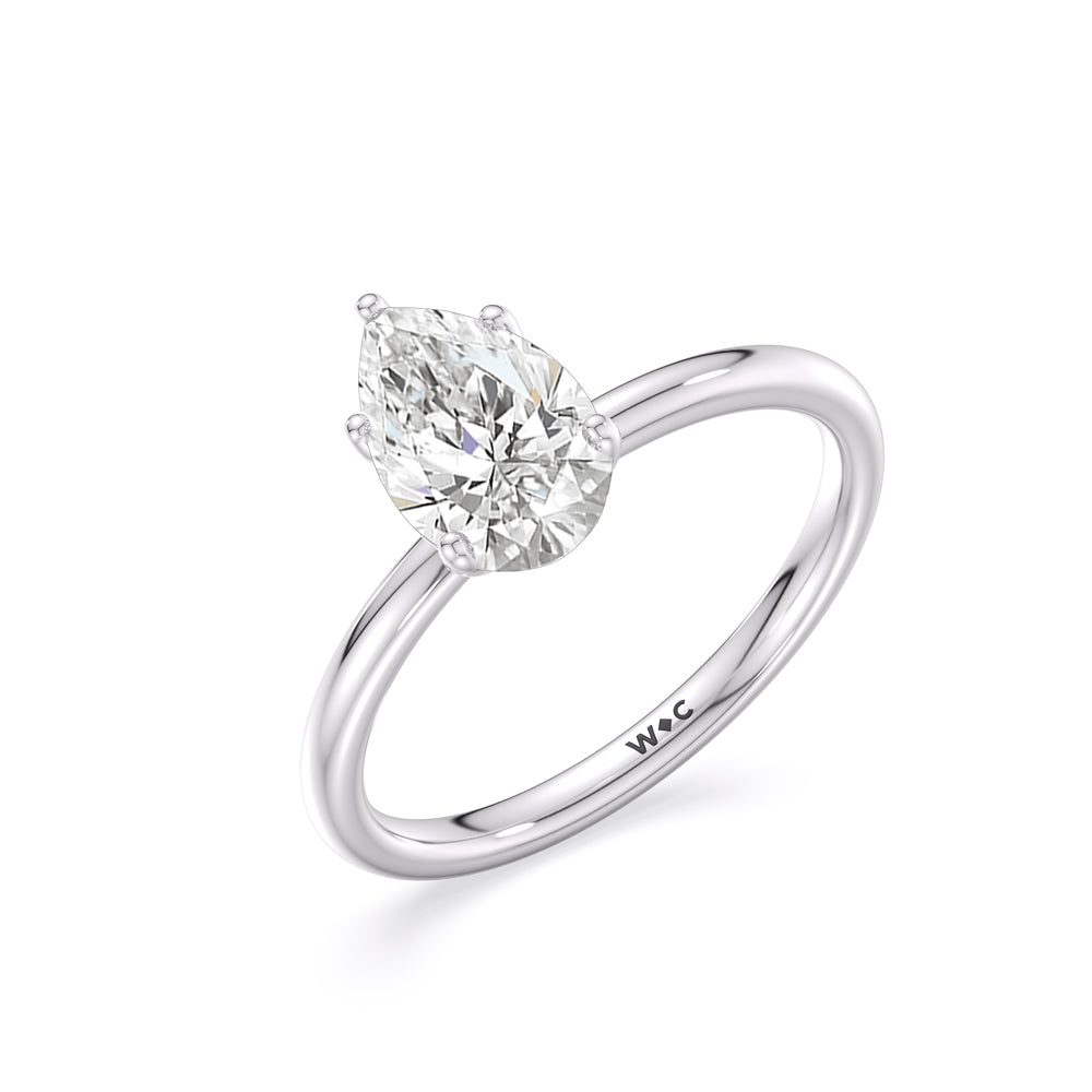 Classic Four Prong Petite Comfort Fit Solitaire Engagement Ring with Pear Cut Diamond in 14KT Platinum view 4
