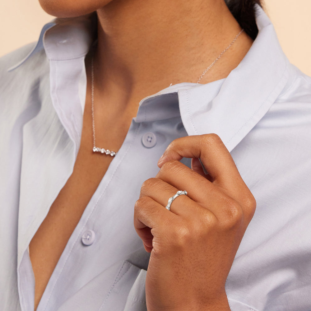 Model Wearing Celestia Marquise Set Studded Gallery Wedding Band view