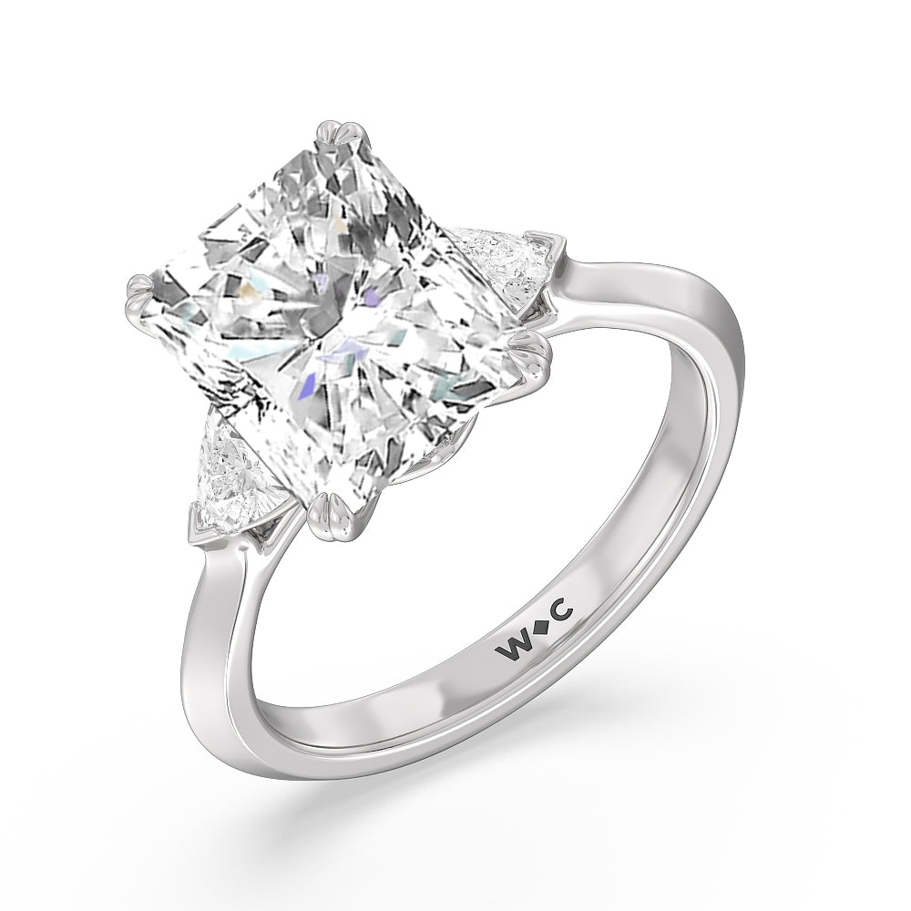 Three stone trillion engagement rings discount