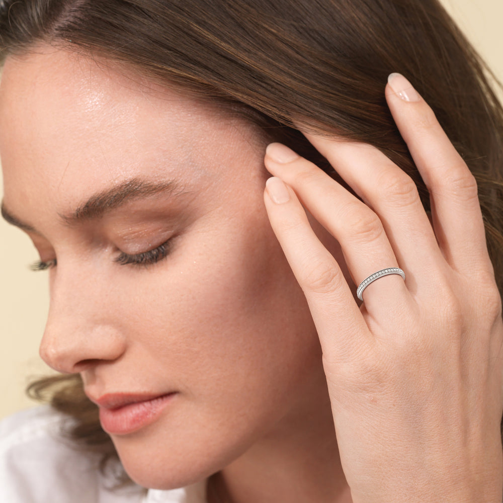 Model Wearing Tapering Scalloped Hidden Halo Diamond Wedding Band view