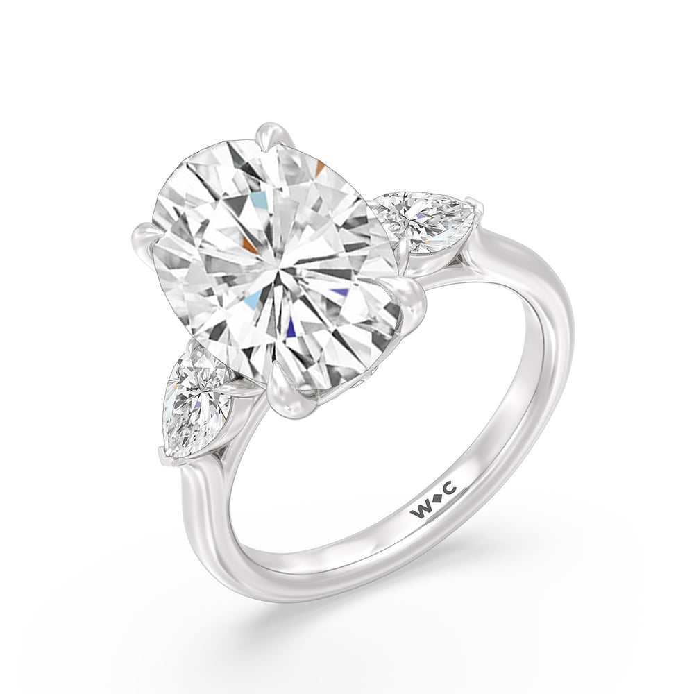 Opulent Classic Pear Trio Ring with Oval Cut Diamond in 14KT Platinum view 3
