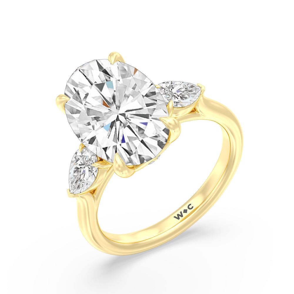Opulent Classic Pear Trio Ring with Oval Cut Diamond in 14KT Yellow Gold view 3

