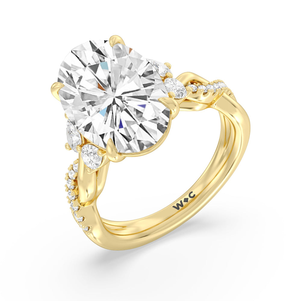 Extravagent Twisted Trio Ring with Oval Cut Diamond in 14KT Yellow Gold view 3
