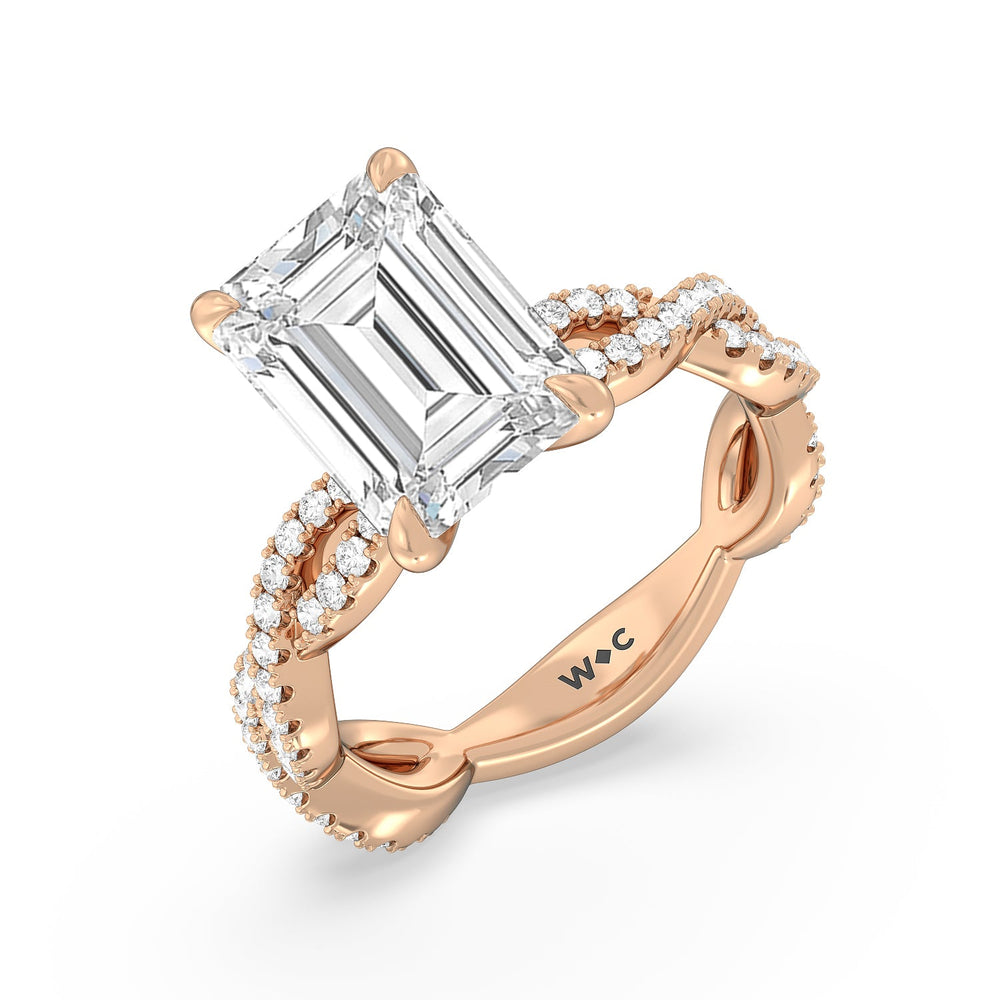Magnificient Twist Ring with Emerald Cut Diamond in 14KT Rose Gold view 3
