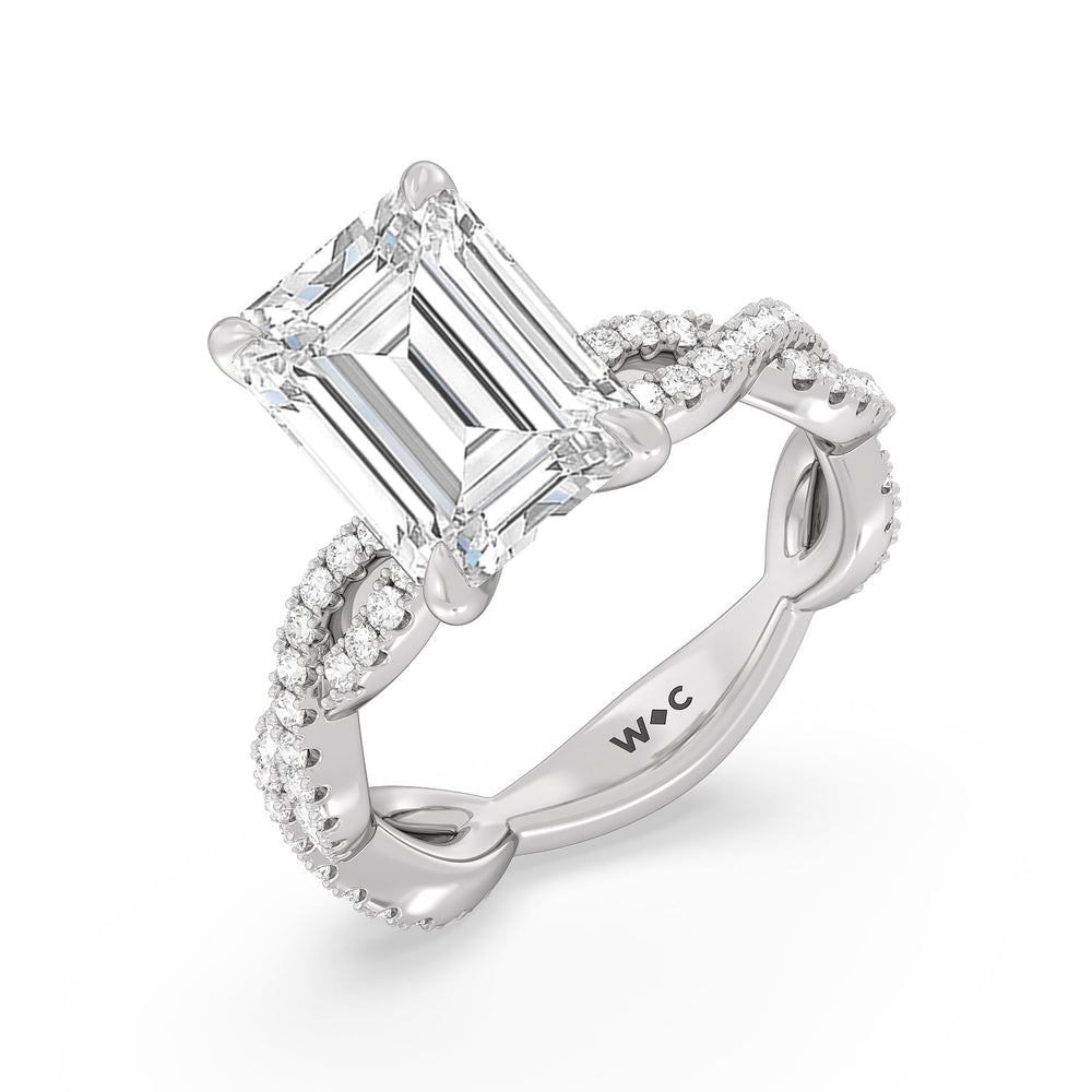 Magnificient Twist Ring with Emerald Cut Diamond in 14KT Platinum view 3
